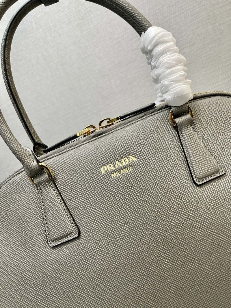 Pra*a top handle bags